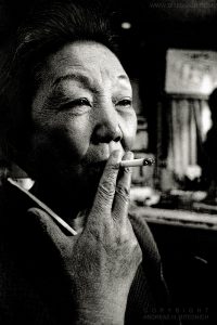 Mama Kyoko Maruyama smoking, Tokyo, Japan 2012